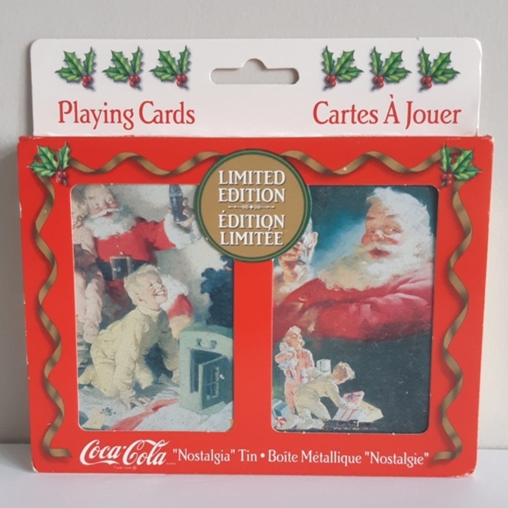 Sealed 1996 Coca-Cola playing cards in tin